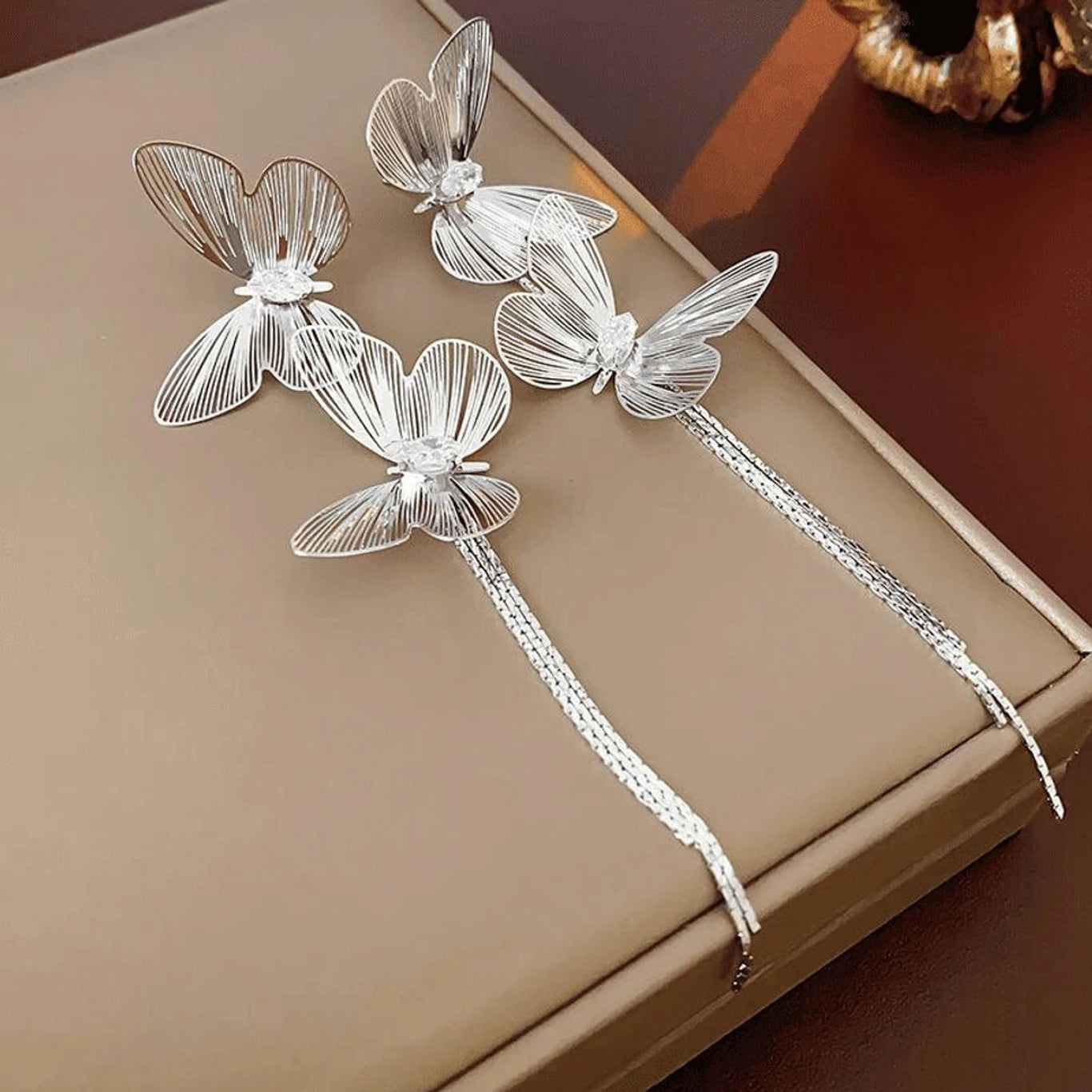 Silver butterfly tassel statement earrings - AR-163