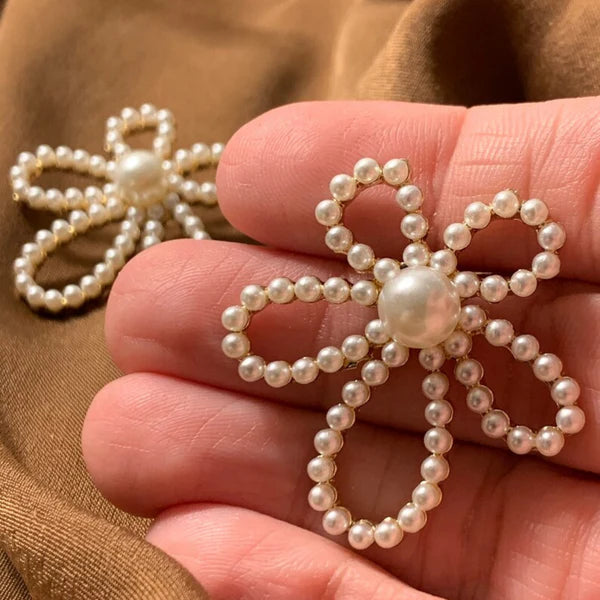 Pearl bow statement earrings - AR-162