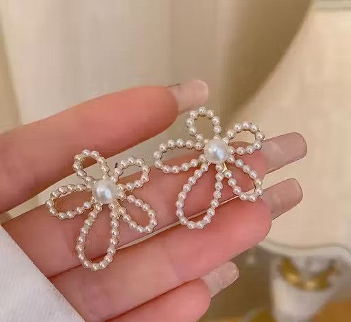 Pearl bow statement earrings - AR-162